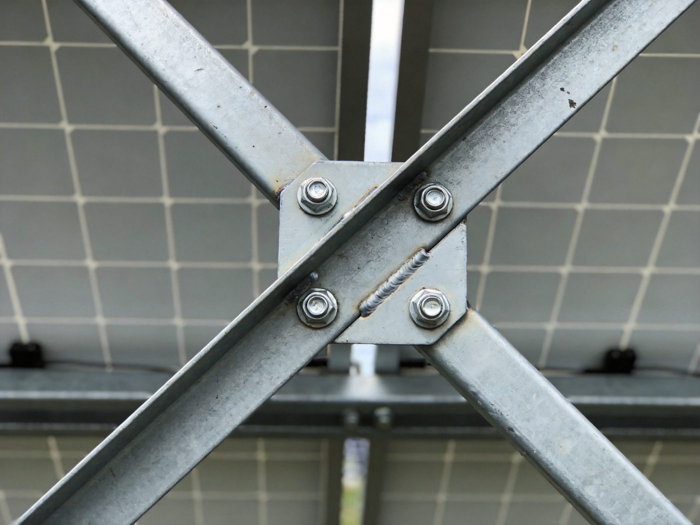 Diagonal structural bracing with bolted gusset on a solar frame